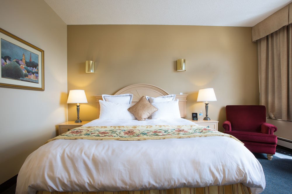 NOMAD INN AND SUITES