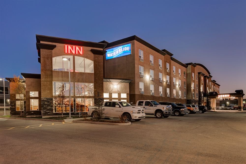 SERVICE PLUS INNS AND SUITES