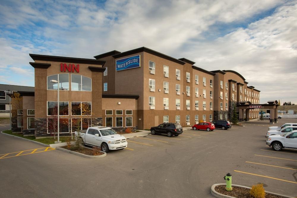 SERVICE PLUS INNS AND SUITES photo 2