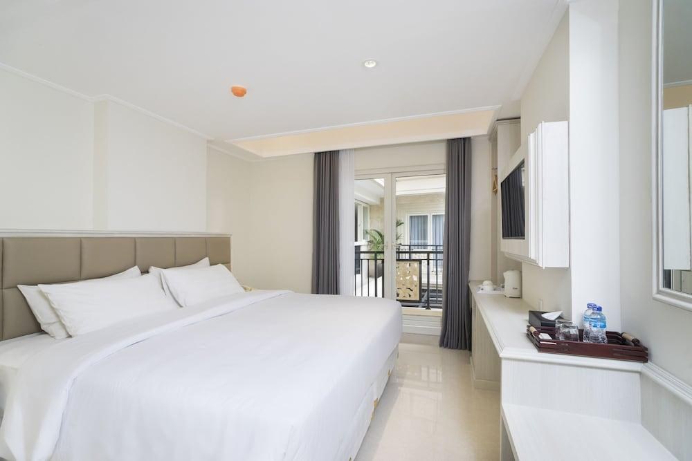 Alron Hotel Kuta Powered by Archipelago photo 4